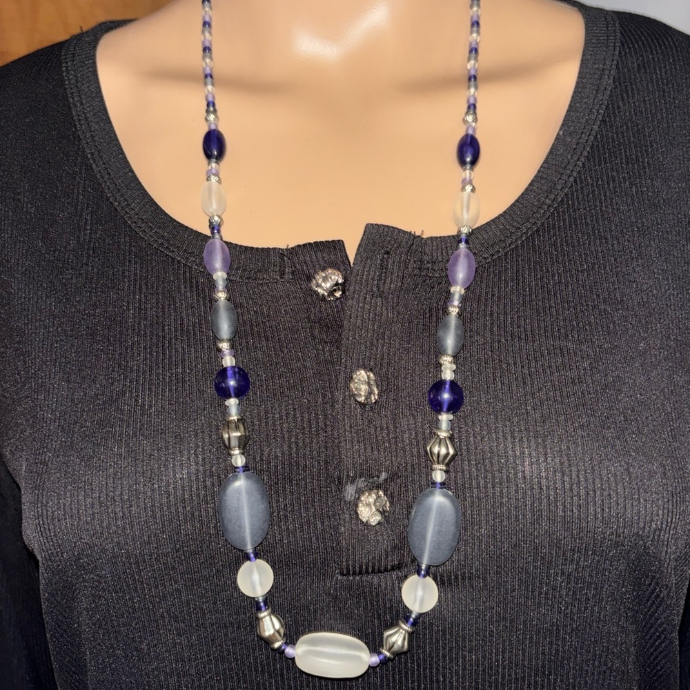Beautiful purple and blue glass bead statement necklace with silver accents.